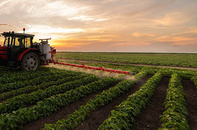 tractor spraying pesticides